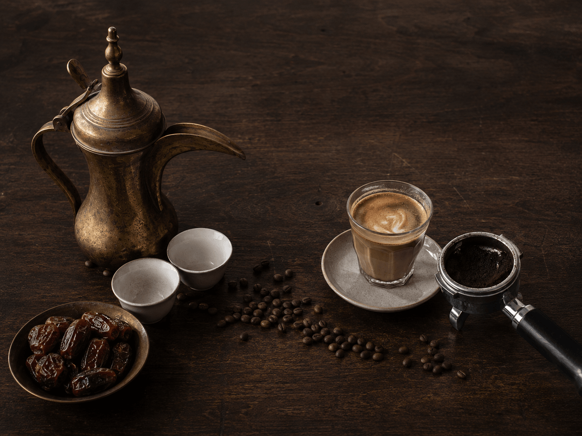 Gahwa poured from a dallah alongside an espresso on the AHOA counter Gahwa poured from a dallah alongside an espresso on the AHOA counter