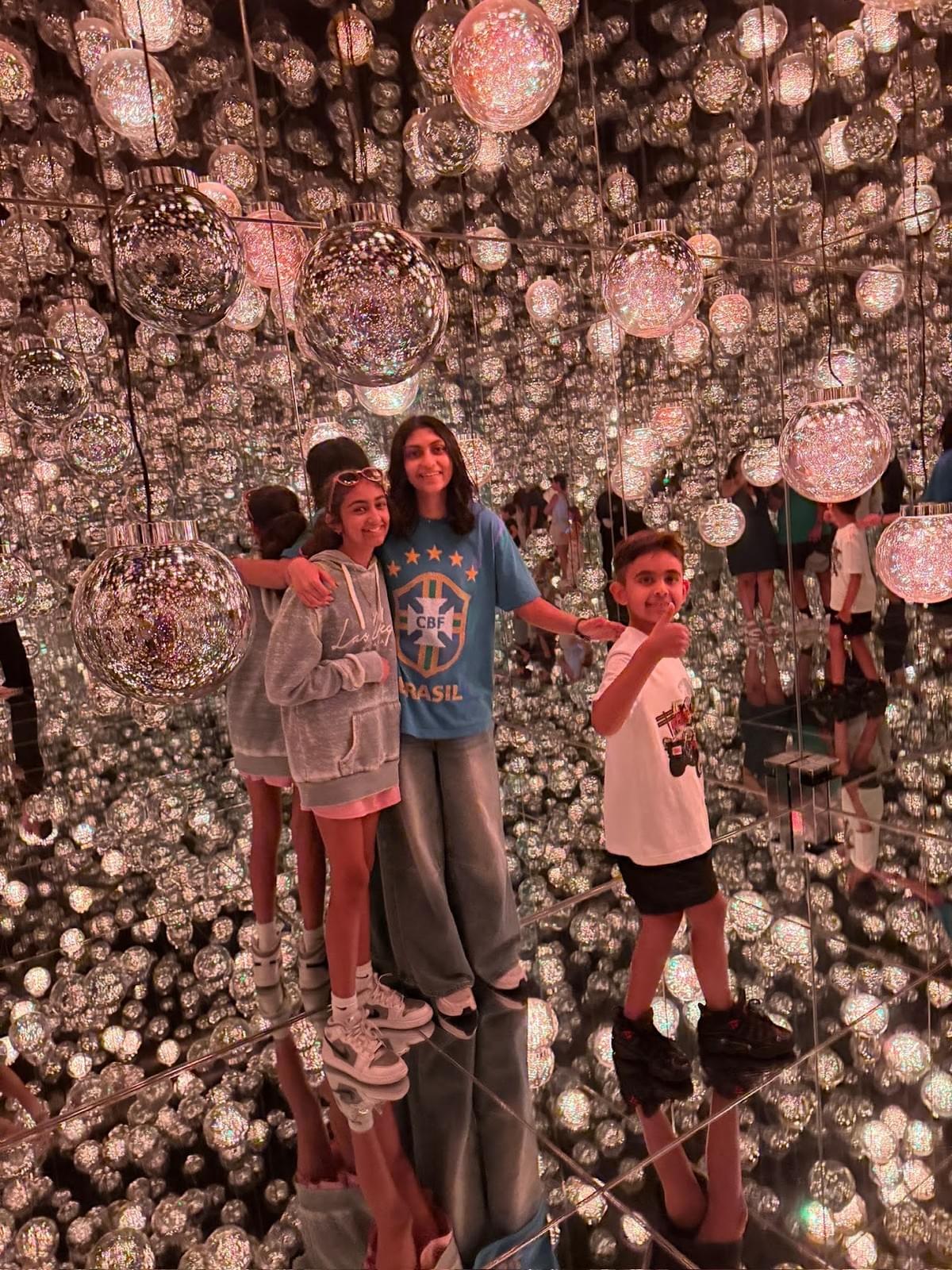 FamTripping family trip to Japan with the Devani and Ali family at teamLab Borderless in Tokyo in summer 2026.