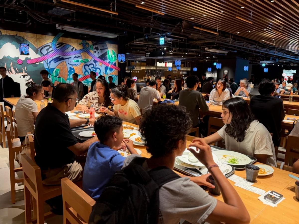 FamTripping family trip to Japan with the Devani and Ali family at Time Out Market Osaka in summer 2026.