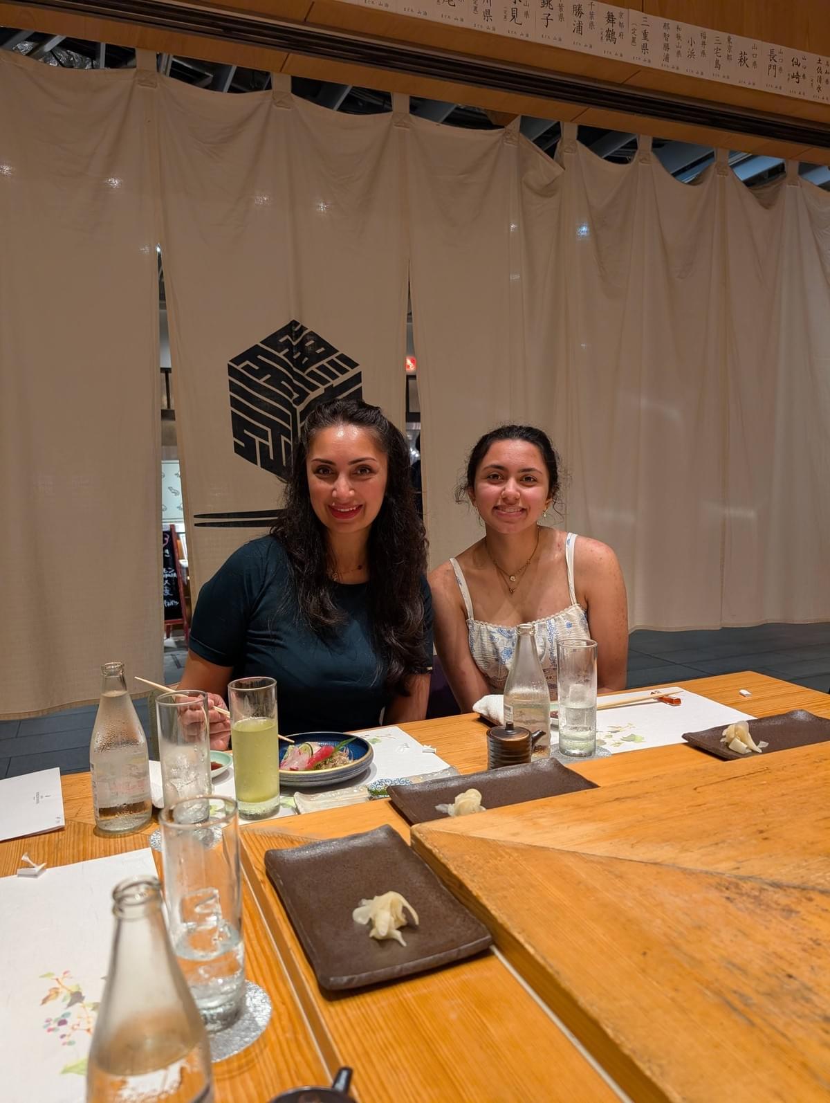 FamTripping Japan trip with the Devani and Ali family enjoying omakase at Sushi Kyotatsu Ark Hills South Tower in Tokyo in summer 2026.