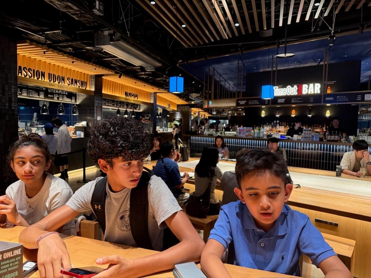 FamTripping family trip to Japan with the Devani and Ali family at Time Out Market Osaka in summer 2026.