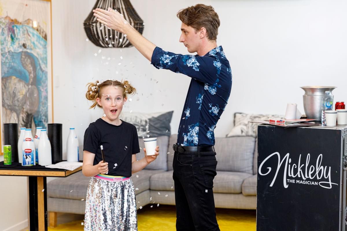 Magician performs at Birthday Party