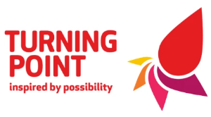 The Turning Point logo featuring bold red uppercase text reading ‘TURNING POINT’ with the tagline ‘inspired by possibility’ below in purple, alongside a multicoloured abstract droplet‑shaped design.