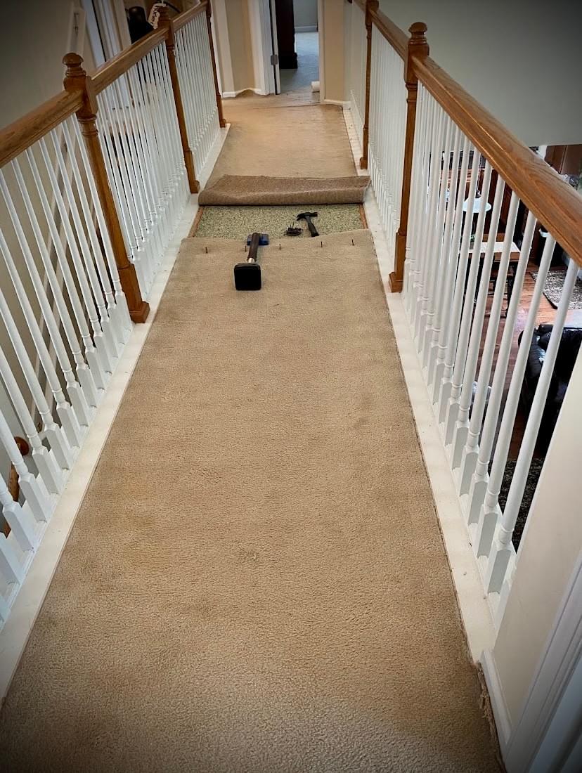 Carpet repaired and stretched on catwalk in Hendersonville home