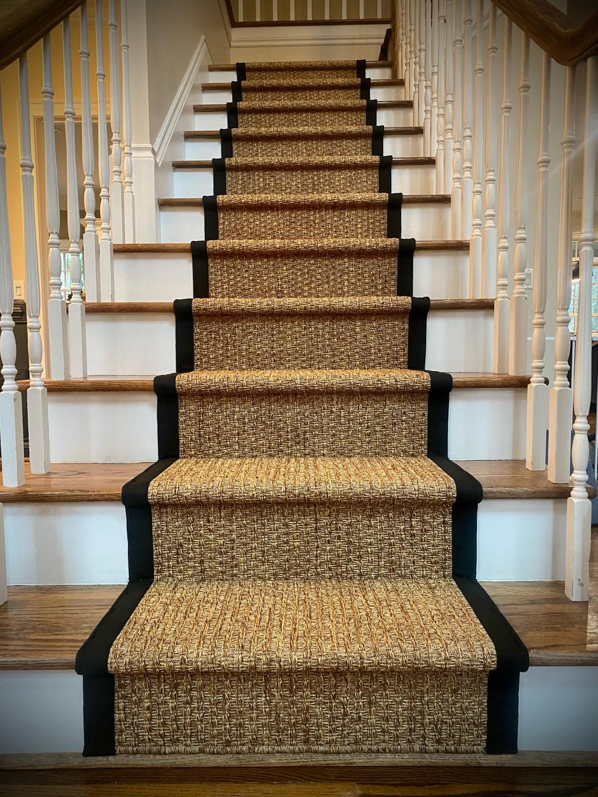 Seagrass carpet stair runner on white and oak staircase