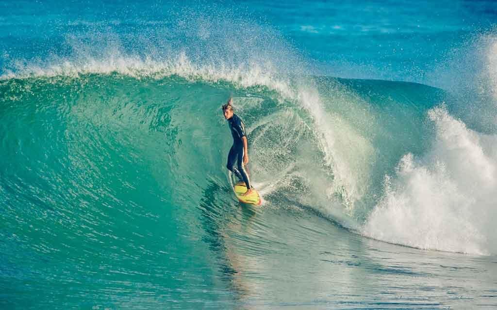 physicians enjoying kitesurfing during sunset physicians enjoying kitesurfing during sunset