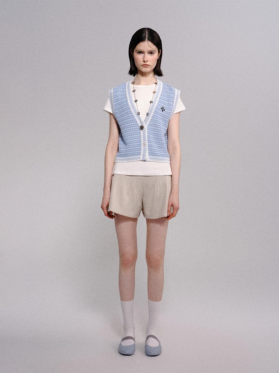 Tokokkino * blue and white patchwork vest