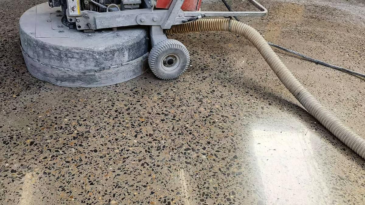 Concrete floor grinding stage using metal bond diamond tools Aggregate exposure after metal bond grinding and scratch refinement