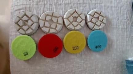Customer received 100mm resin polishing pads in 50, 100, 200 and 400 grit for marble and terrazzo wet polishing.