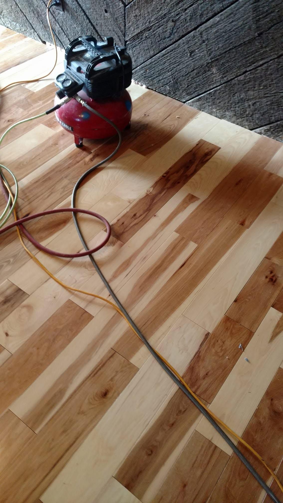 Hardwood floor installation in progress