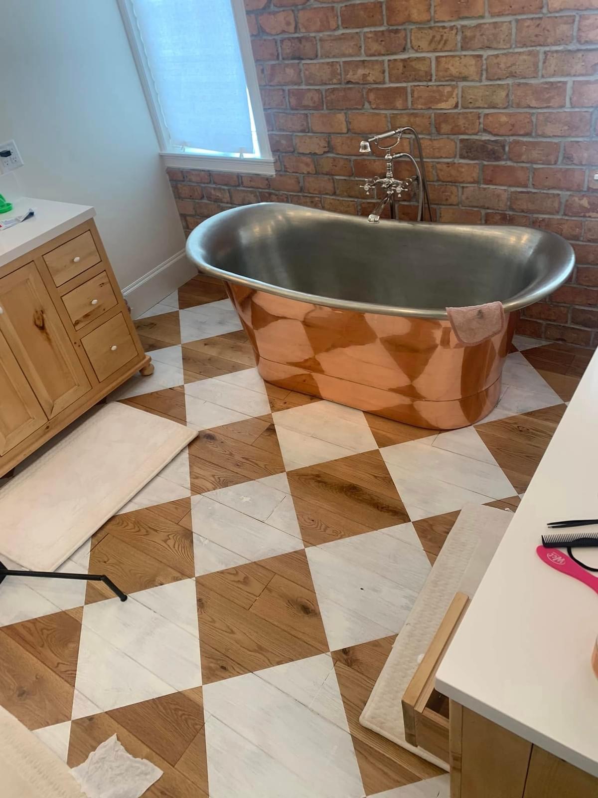Custom wood floor repair and inlay detail