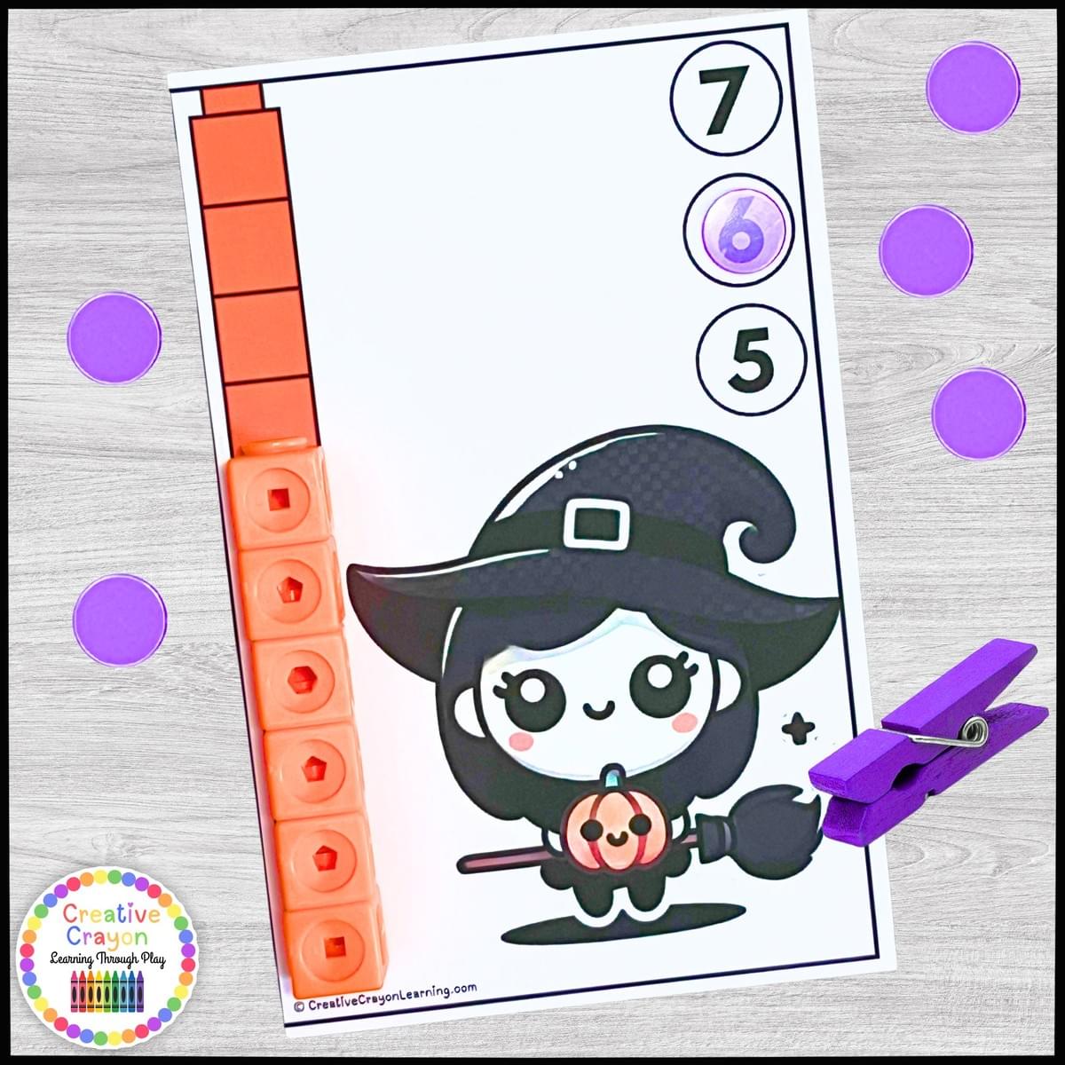 Halloween measuring math center for kindergarten with spooky character cards and math link cubes for non-standard measurement practice.