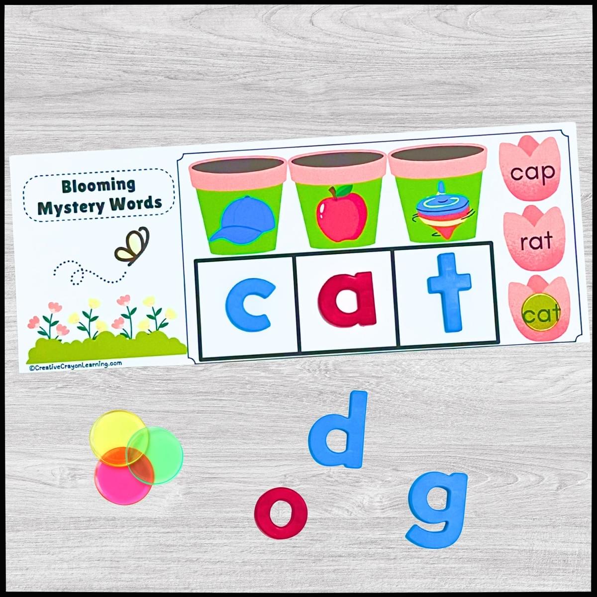 Spring-themed CVC word blending center for kindergarten with picture clues and clip card