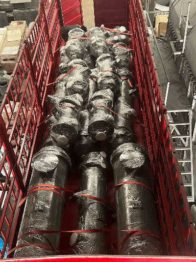 Falling film evaporator loaded on dedicated truck for chemical processing equipment delivery