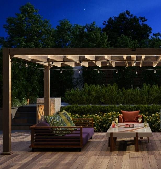 Pergola with hardwood deck string lighting and outdoor furniture
