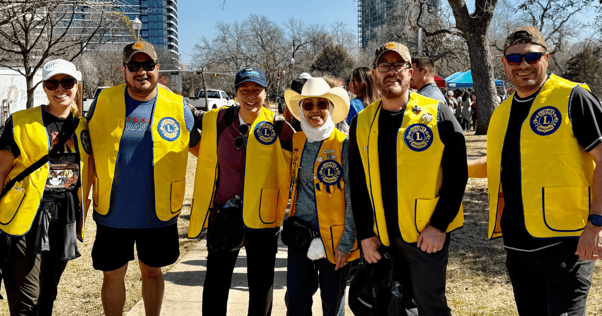 Dallas Founder Lions Club volunteers after a community park cleanup in Dallas, supporting local environmental service projects and community engagement