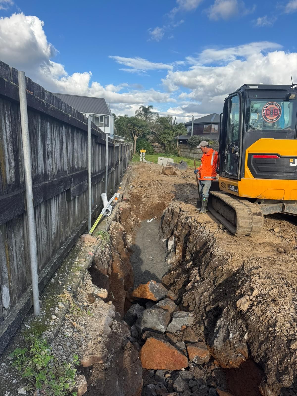 Public stormwater and wastewater infrastructure works for a 9-lot residential subdivision on Ti Rakau Drive, Pakuranga. The project was located on a busy arterial road and required extensive traffic management and three weeks of night works from 9pm to 5am. The works included approximately 25m each of stormwater and wastewater pipeline installed by full open-cut excavation along the footpath. Night-time visibility and working within a live traffic environment added significant construction challenges.