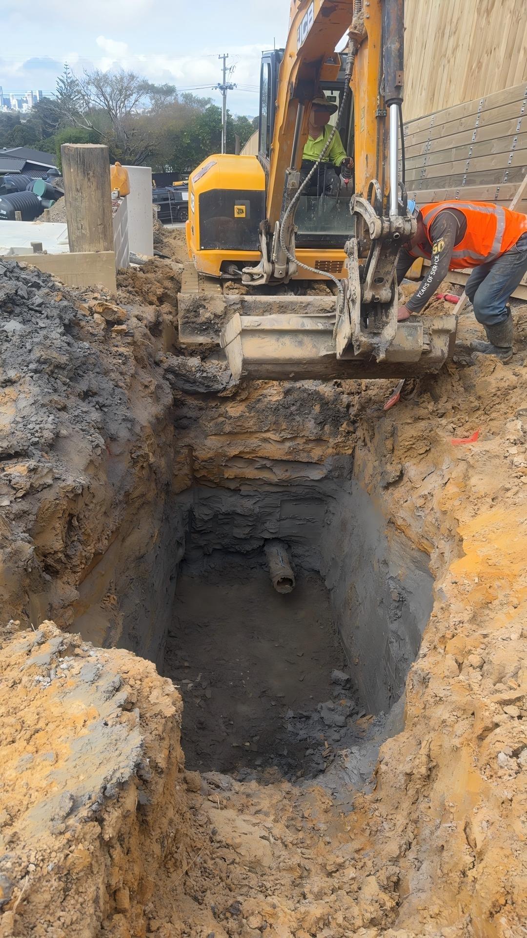 Public stormwater and wastewater infrastructure works for a 5-lot residential subdivision in Northshore, Auckland. The project included stormwater pipe outside the site boundary, plus 40m sections of 180mm PE stormwater and wastewater pipe installed by underground boring within the site. The works included multiple manholes and electrofusion-welded saddle connections, with soft ground conditions and limited site access adding to the construction challenges.