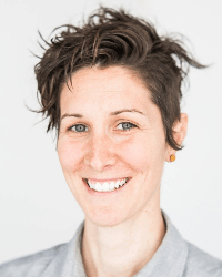 Lindsey, compassionate healthcare provider, assisting a patient with personalized acupuncture treatment, fostering balance and healing in the body.