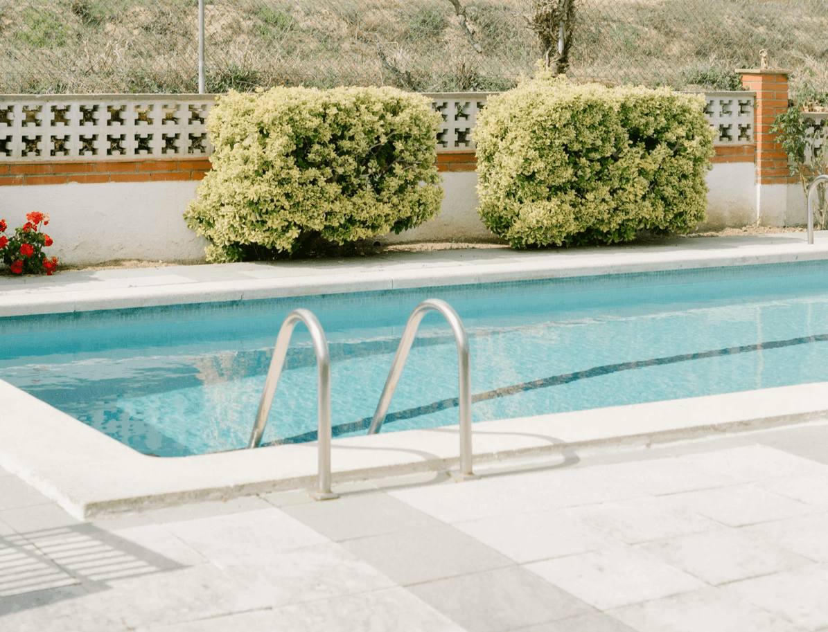 Beautiful decorative block fence surrounding a pool in Avondale AZ