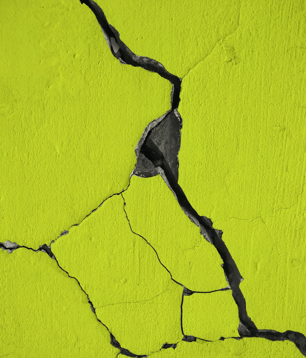 Broken concrete block wall in need of repair and restoration in Avondale Az