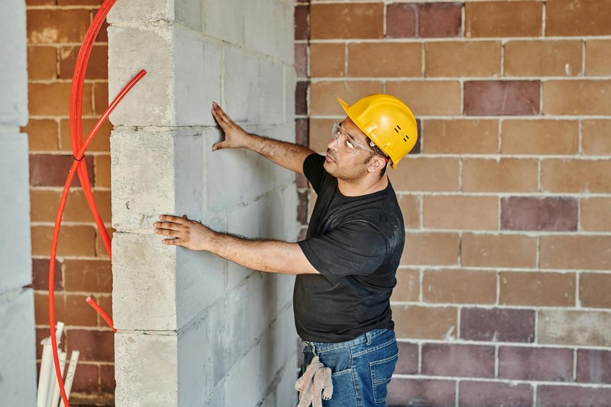 Man building a block wall near Avondale AZ