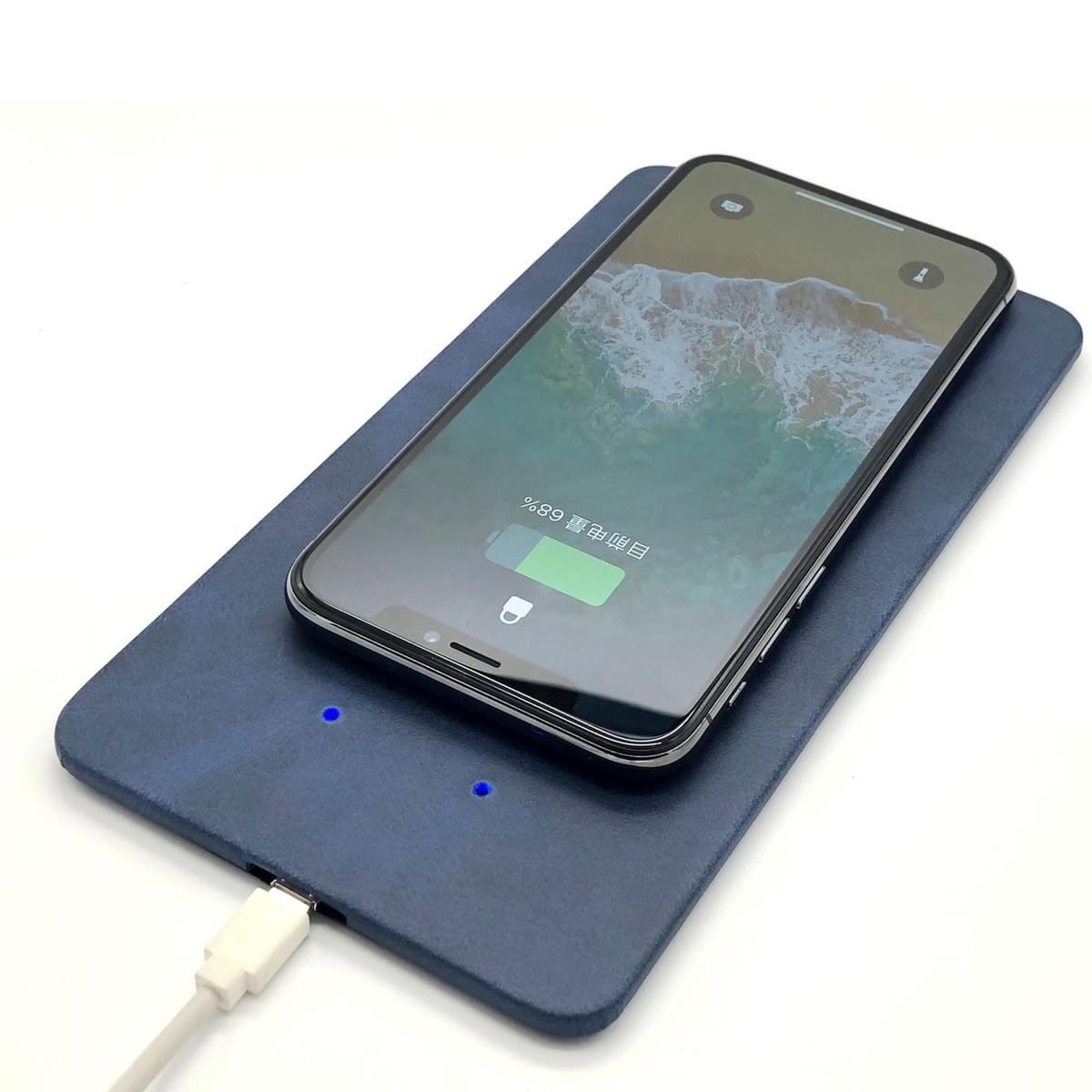 Magnetic wireless charging leather pad for mobile phones