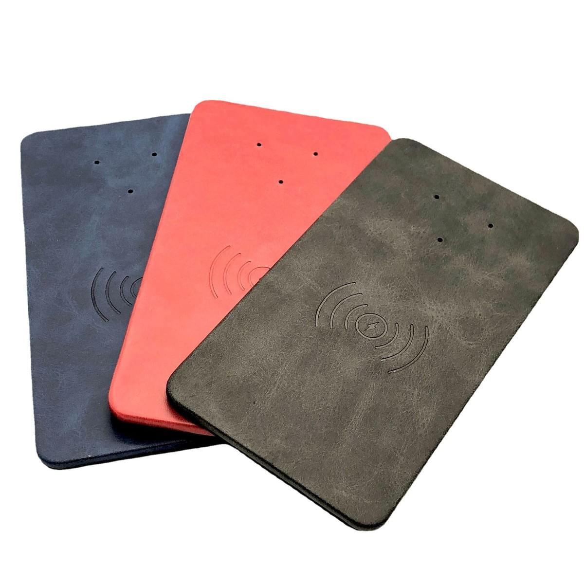 Magnetic wireless charging leather pad for mobile phones