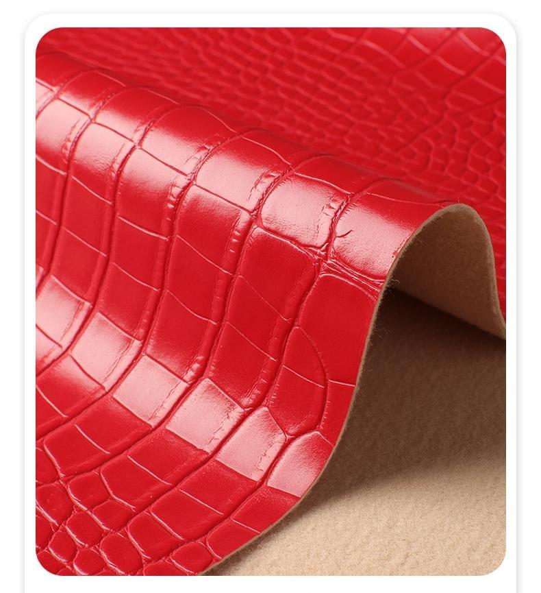 Brushed fabric-backed matte crocodile-patterned and stone-patterned PVC artificial leather