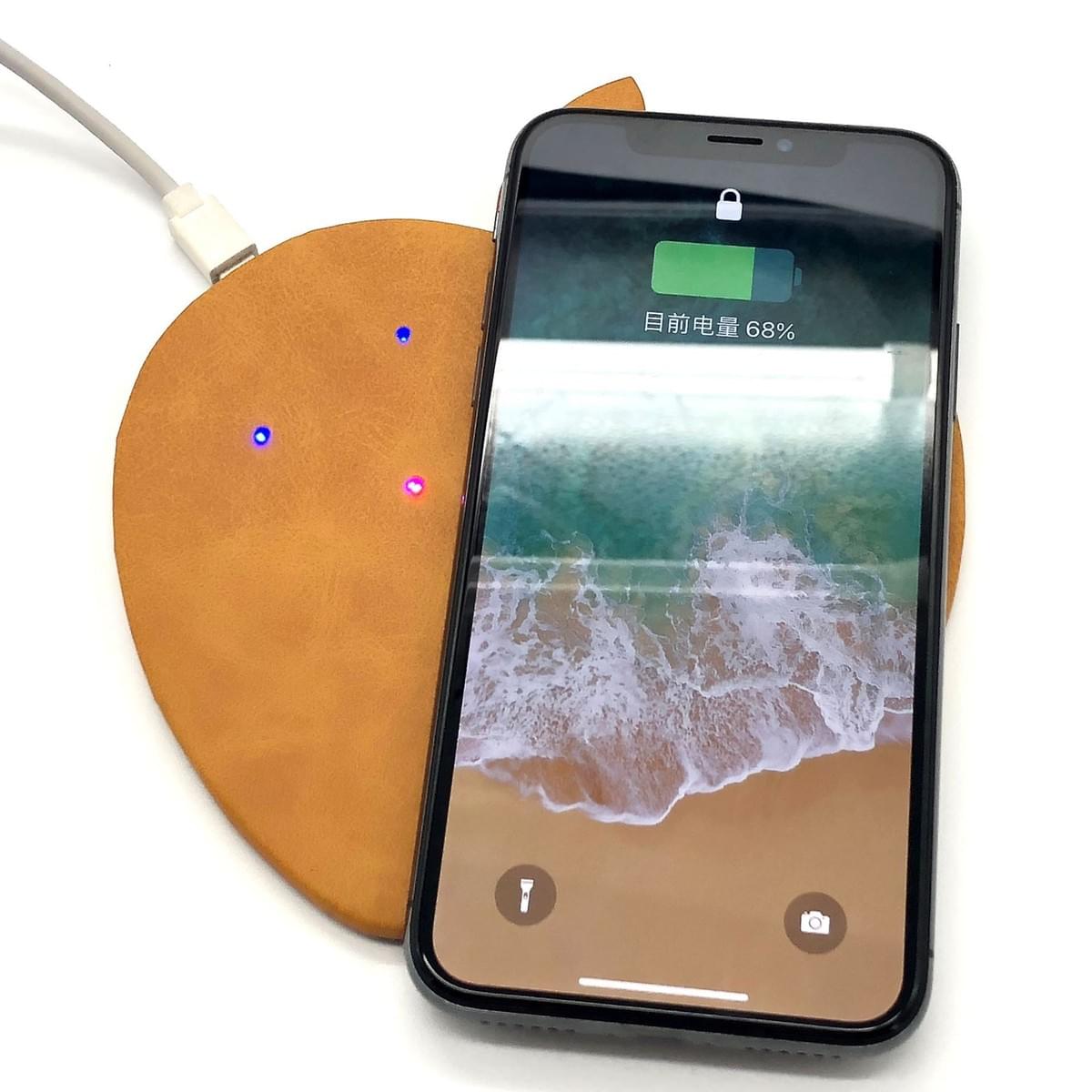 Magnetic wireless charging leather pad for mobile phones