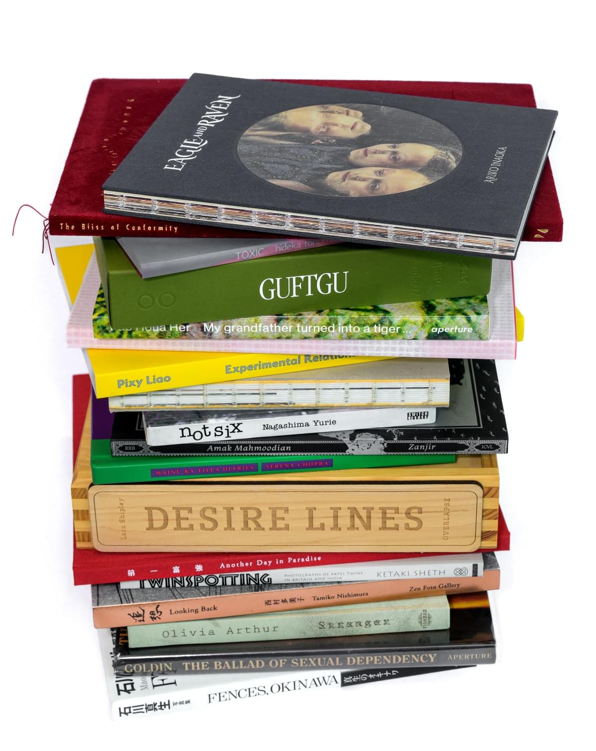 Photobooks By Women  stack of Photobooks By Women 