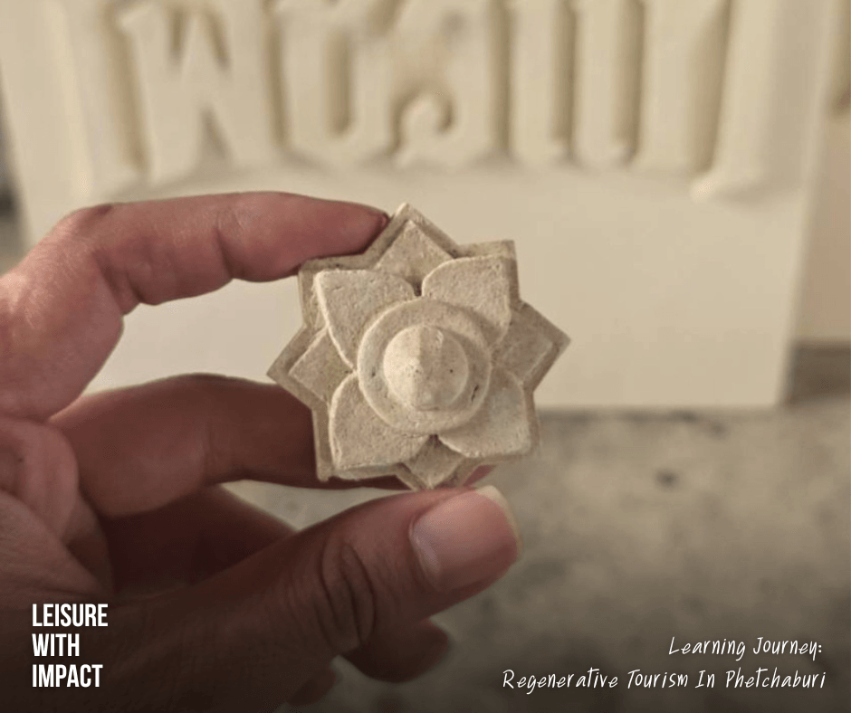 A local artisan demonstrating traditional lime stucco craftsmanship in Phetchaburi, preserving Thai heritage through regenerative tourism