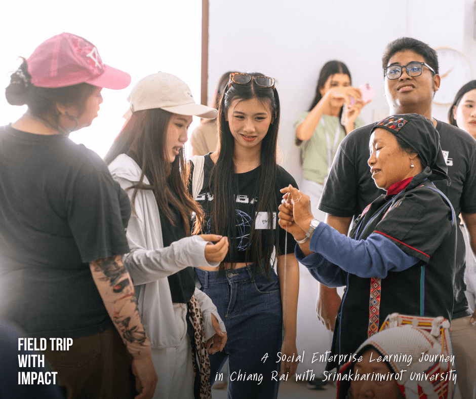 University students participating in educational travel in Thailand, experiencing experiential learning through community engagement and social enterprise field study.