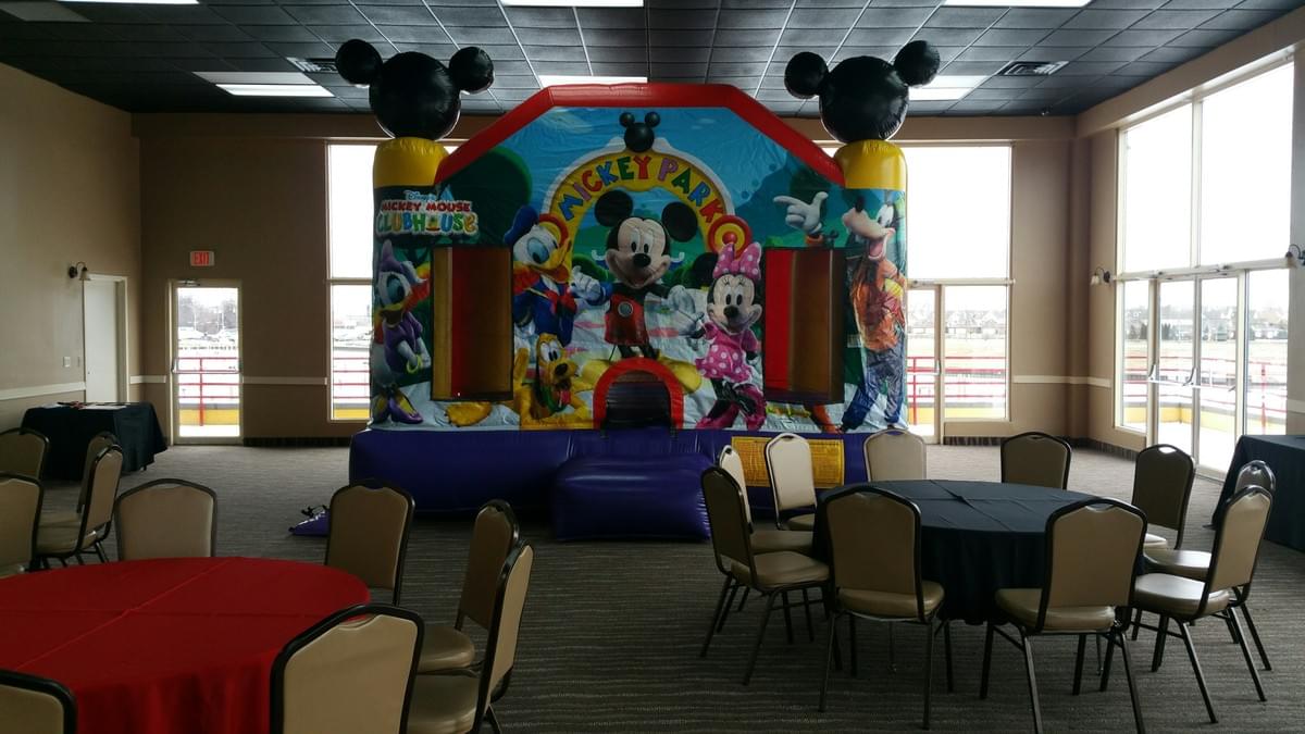 Bounce house and inflatable water slide rentals set up for backyard in Grosse Pointe Shores Michigan Bounce house and inflatable water slide rentals set up for backyard in Grosse Pointe Shores Michigan