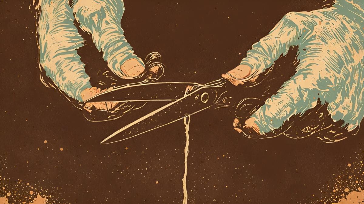 Black scissors positioned to snip a tight white thread.