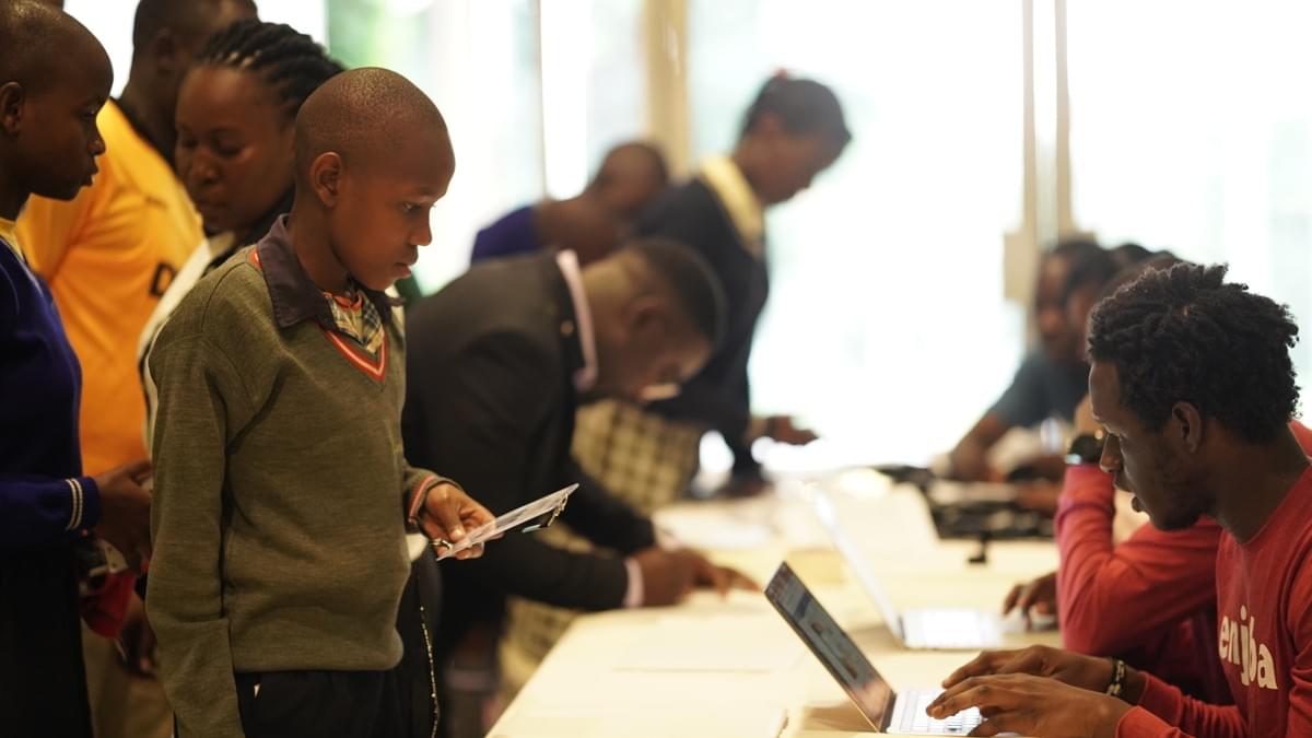 Spellers registering and picking their tags.