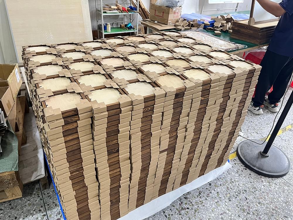 Natural wood frame components organized for small-batch custom production Natural wood frame components organized for small-batch custom production