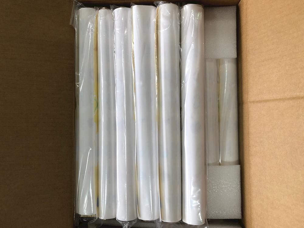 Rolled canvas and poster prints packed for bulk wholesale orders Rolled canvas and poster prints packed for bulk wholesale orders
