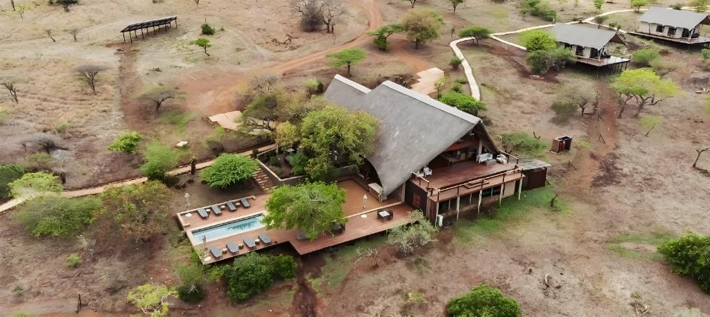 Family enjoying a holiday home with outdoor entertainment area near the beach in Isimangaliso Wetland Park