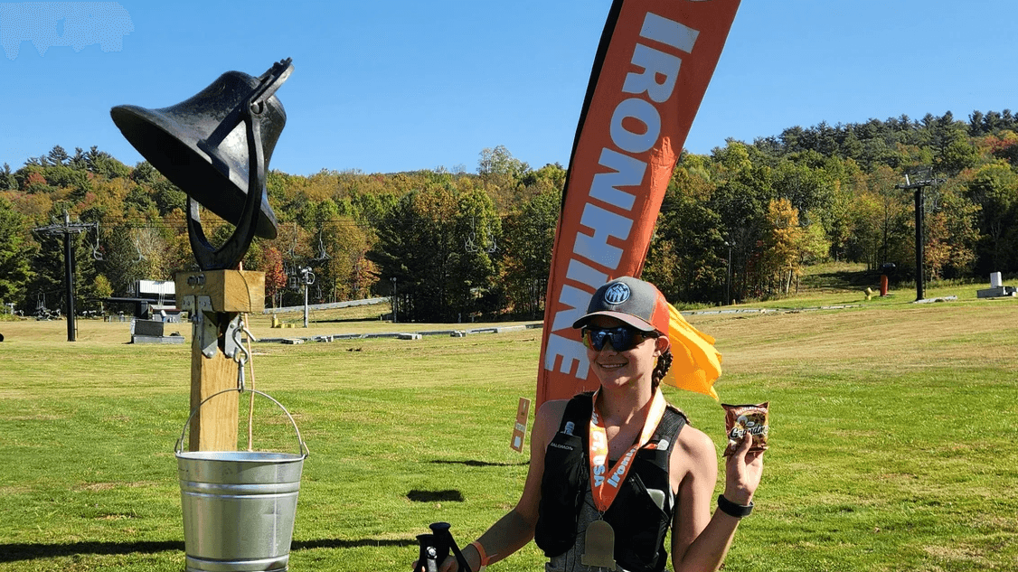 Isabelle Roode at the IronHike bell in her orange Finisher's hat, Answer the Bell Ultra, Mohawk Mountain