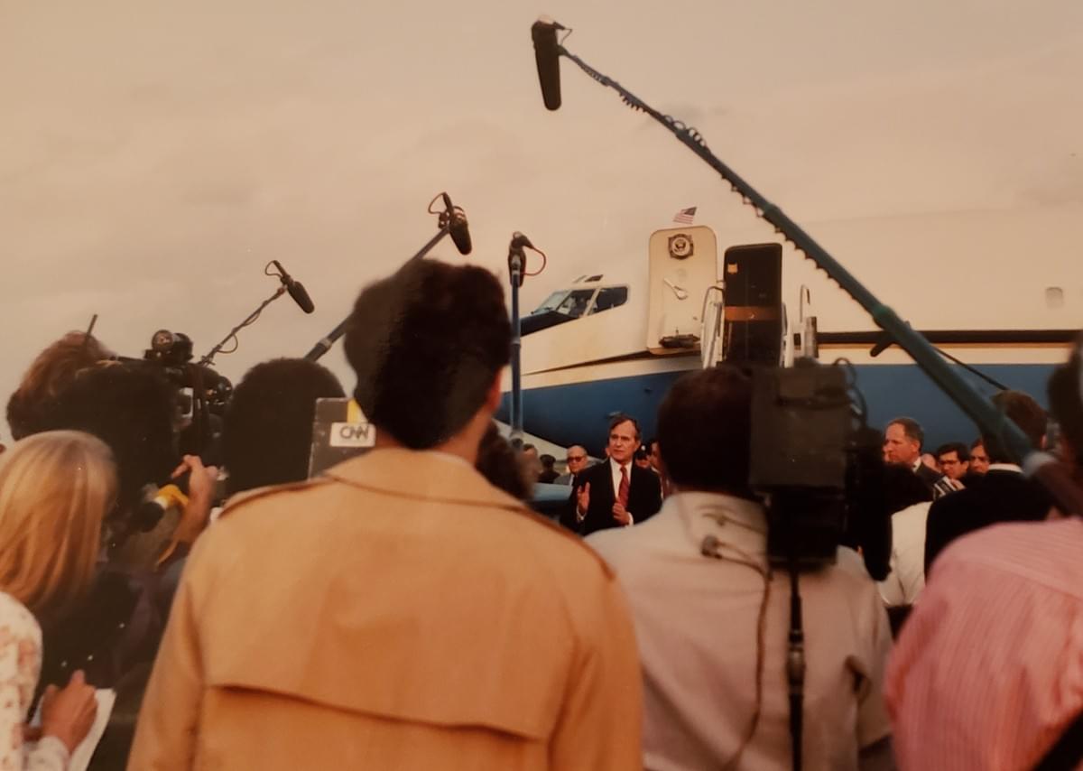 Bernknopf producing news for CNN with George Bush and Air Force one