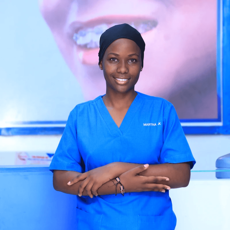 Martha Kisakye Our Smile at the counter 