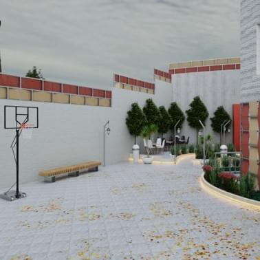 ملعب كرة سلة داخل سكن قصر الصفوة للطالبات قرب الجامعة الأردنية في عمّان، تحيط به حدائق خضراء ومسارات مخصصة للمشي والدراسة ضمن بيئة فندقية راقية وآمنة.