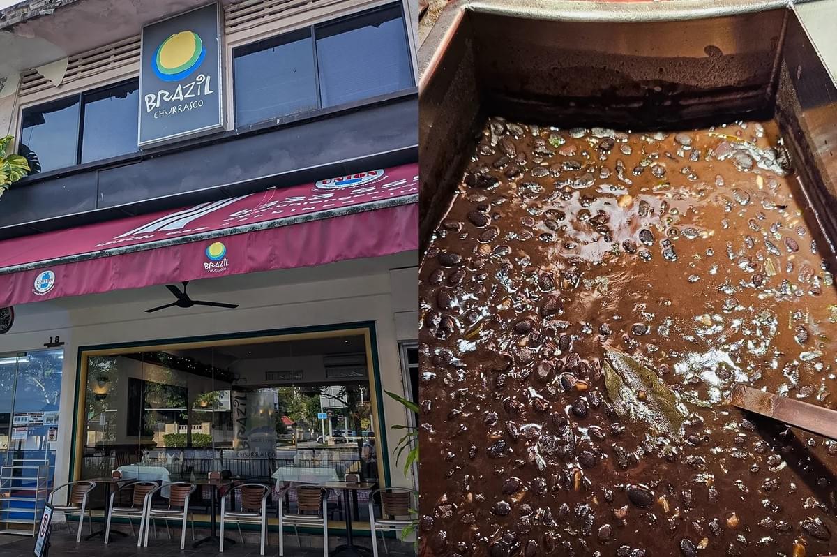 Left: An eye-level, wide-angle exterior shot of the 'Brazil Churrasco' restaurant storefront, featuring a large vertical sign with a yellow and green logo, a deep red awning stretching over outdoor dining tables and chairs, and large glass windows reflecting the street view. Right: A top-down, close-up shot looking into a large metal container filled with a thick, simmering black bean stew (feijoada), showing a textured mixture of beans, spices, garlic chunks, a prominent bay leaf resting near the center, and a metal serving spoon on the side.