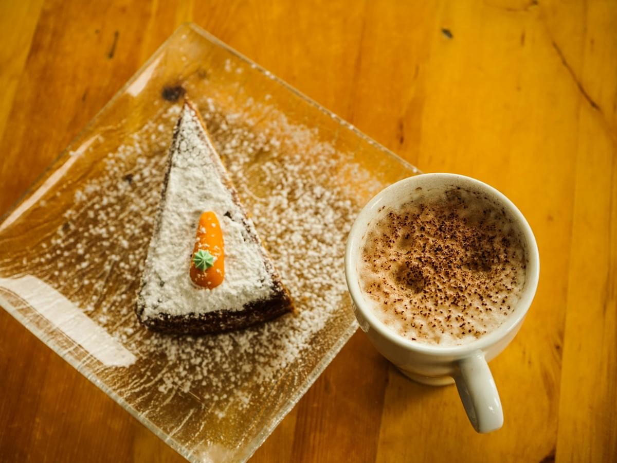 A delicious carrot cake that can be found in the Plain Vanilla Bakery. 