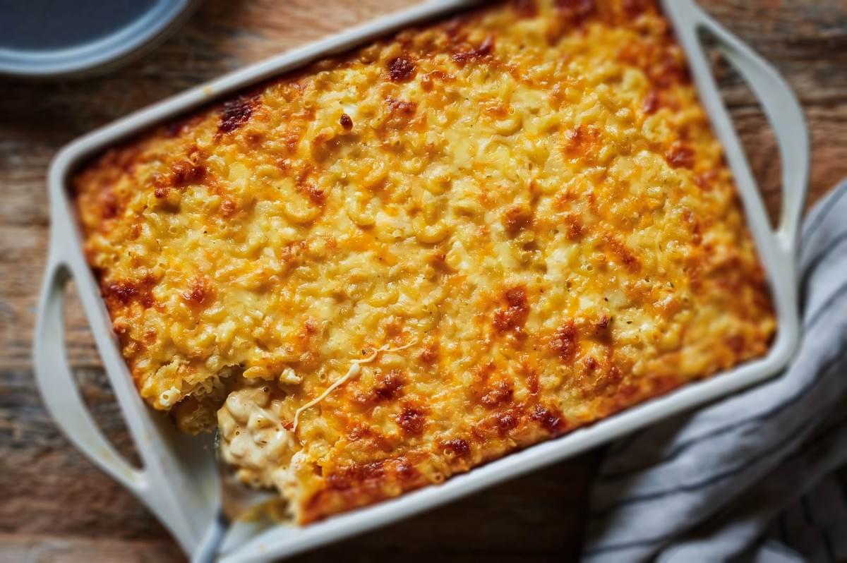 Golden baked Southern mac and cheese in a casserole dish with a crispy, cheesy topping.