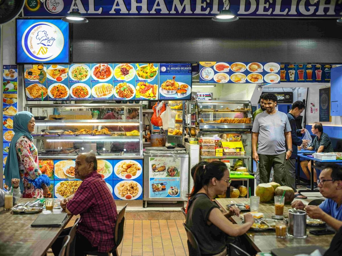 A busy hawker stall, showcasing its popularity among food goers.