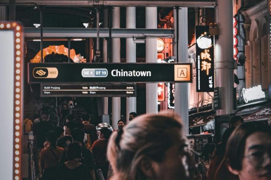 A photo of a busy MRT station in Chinatown Singapore, highlighting its popularity among Singaporeans and foreigners.