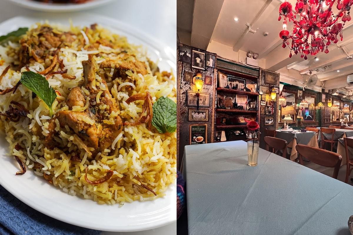 Authentic chicken biryani dish served at a cozy Islamic restaurant with traditional decor.
