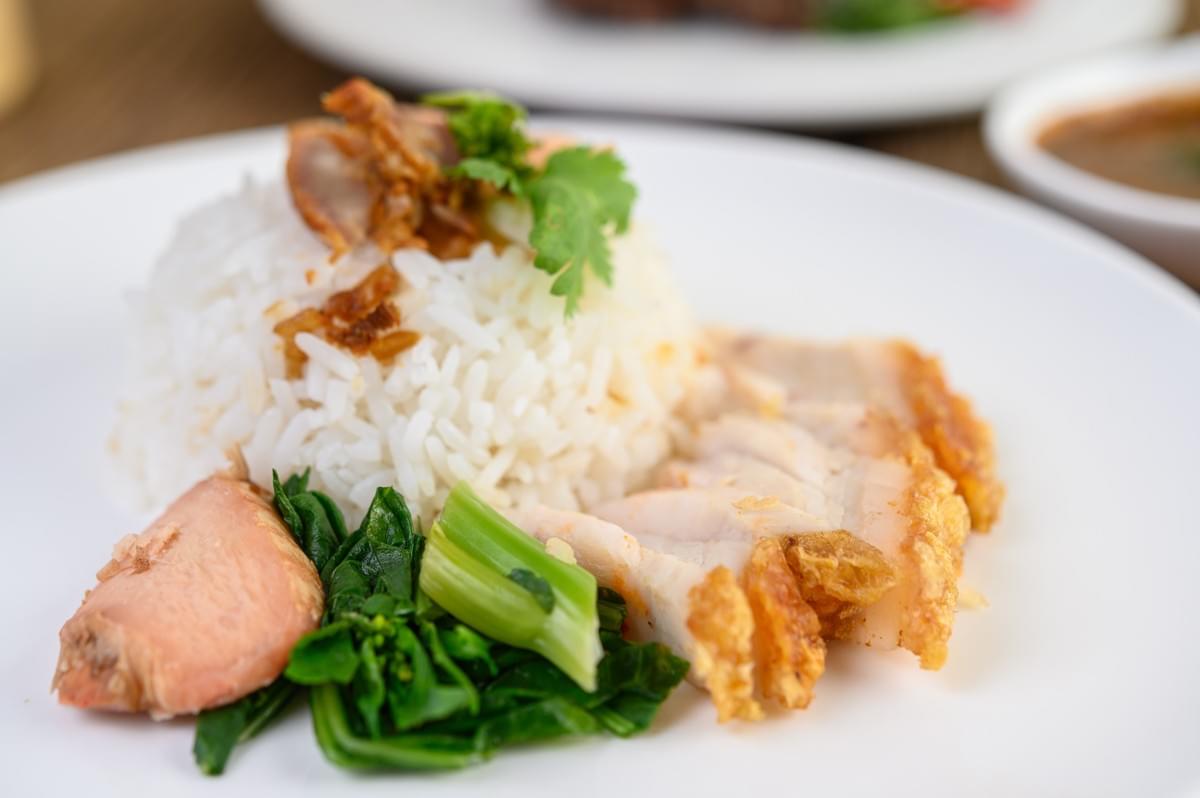 A plate of Hainanese chicken rice, a very fragrant type of dish that you can eat by itself.
